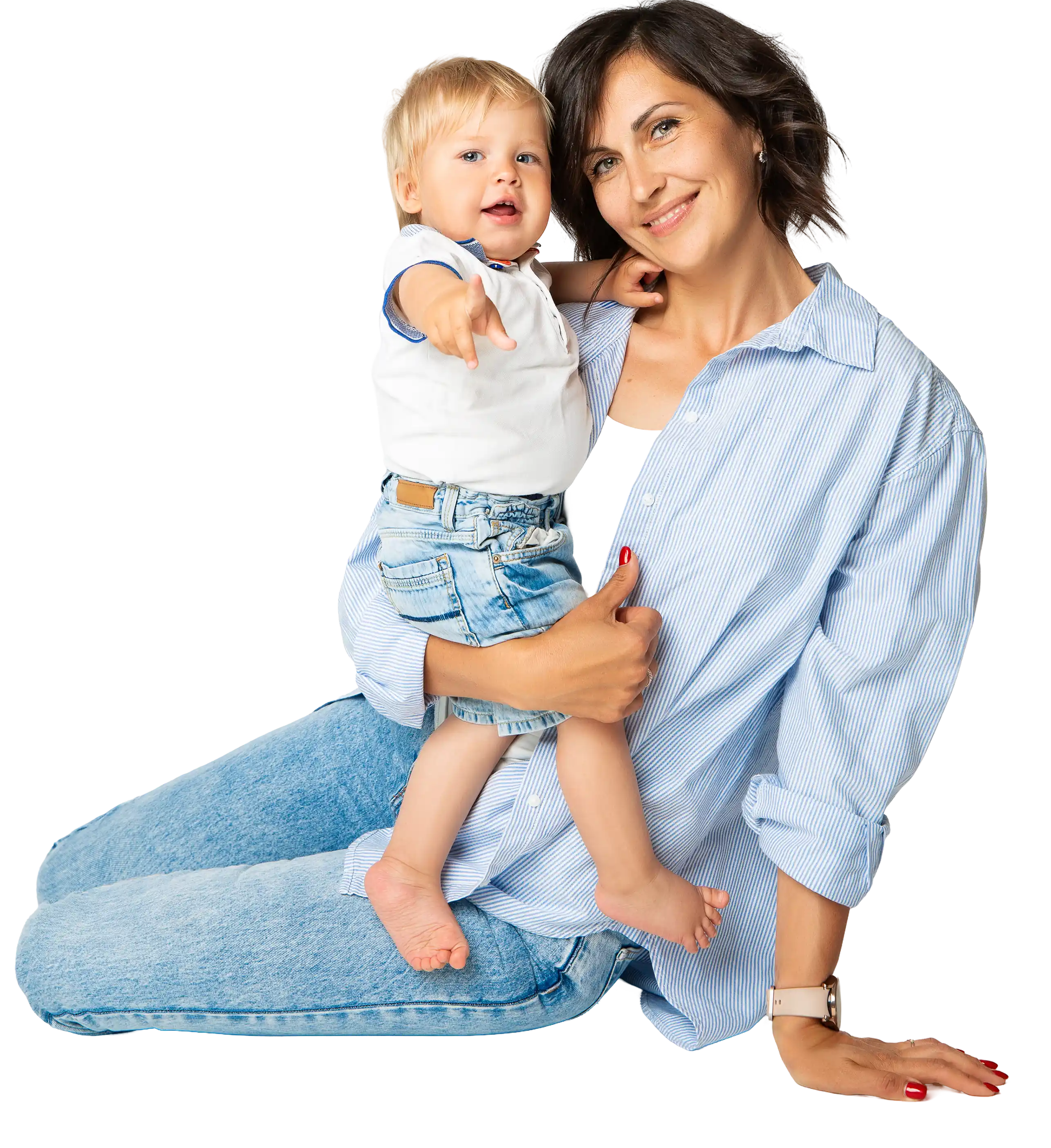 Smiling woman holding a young child.